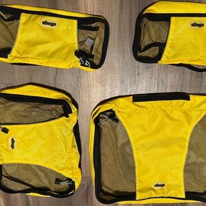 Set of 4 packing cubes with matching toiletry bags